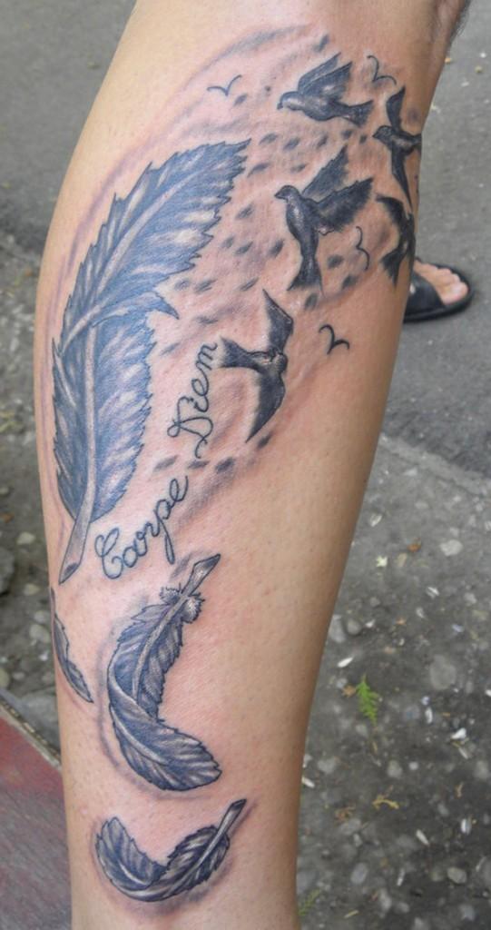 50 Beautiful Feather Tattoo Designs