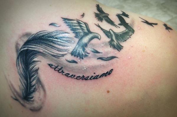 50 Beautiful Feather Tattoo Designs