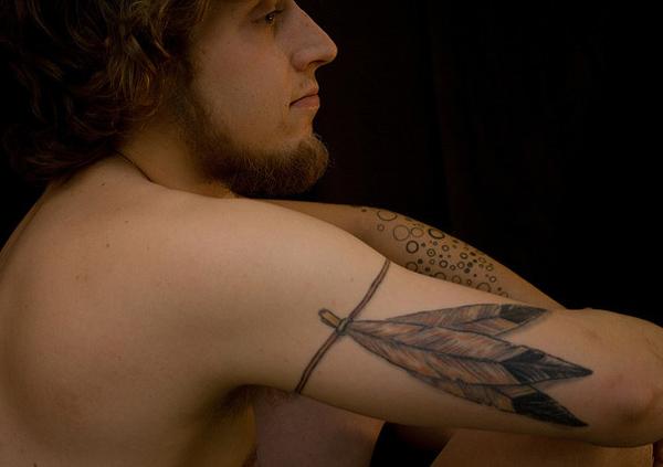 50 Beautiful Feather Tattoo Designs