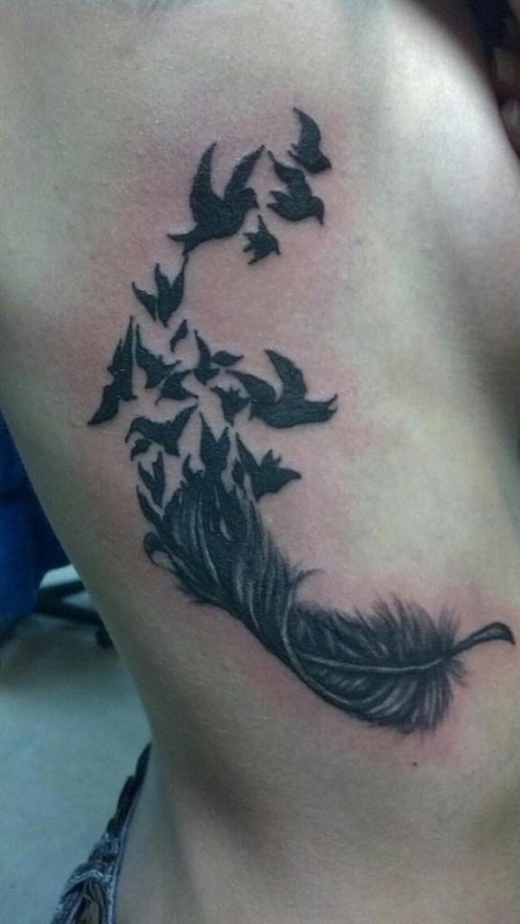 50 Beautiful Feather Tattoo Designs