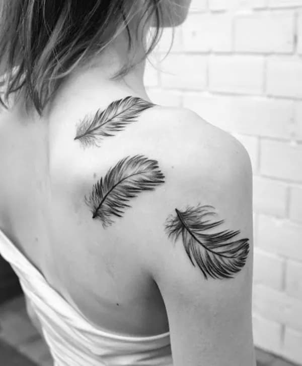 50 Beautiful Feather Tattoo Designs
