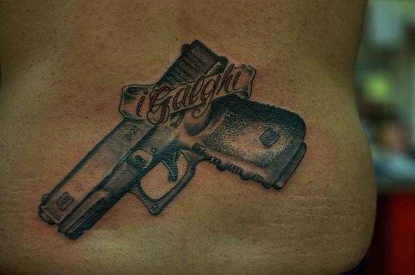 1 gun tattoo 35 Awesome Gun Tattoo Designs