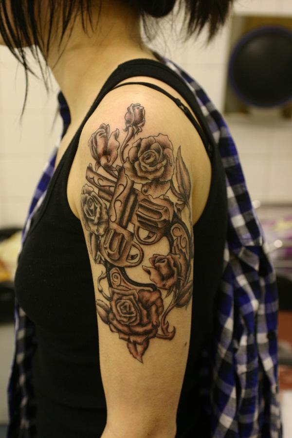 2 gun tattoo 35 Awesome Gun Tattoo Designs
