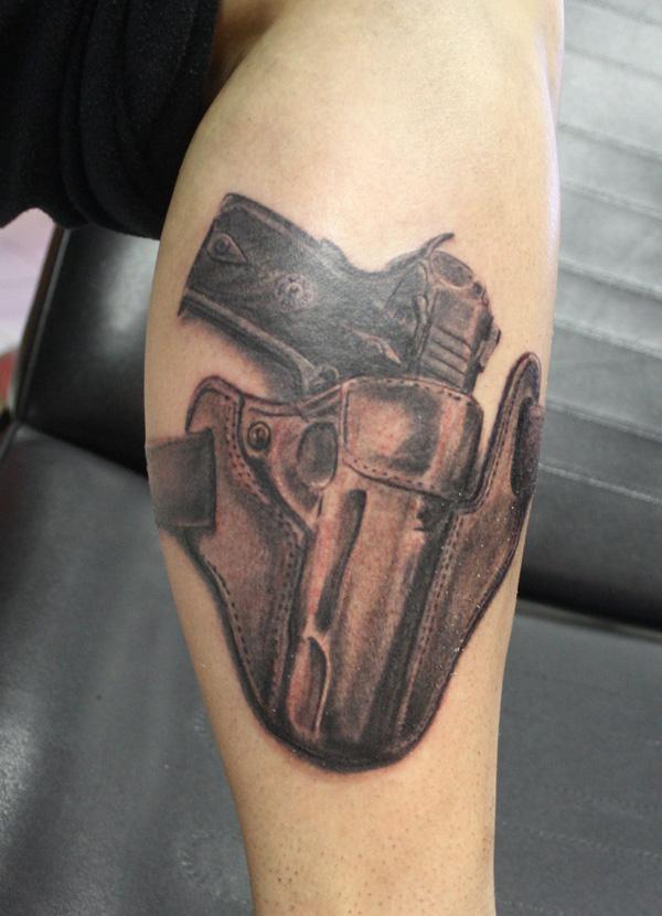 9 gun tattoo 35 Awesome Gun Tattoo Designs