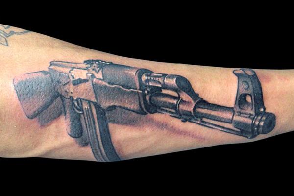 13 gun tattoo 35 Awesome Gun Tattoo Designs