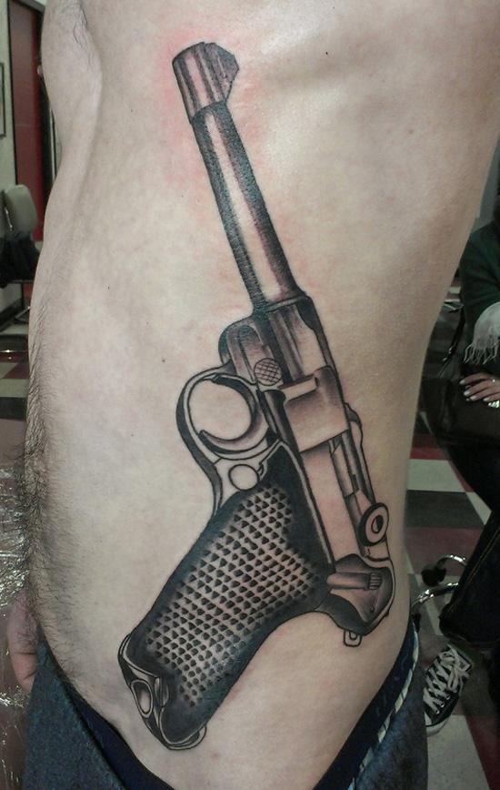 20 gun tattoo 35 Awesome Gun Tattoo Designs
