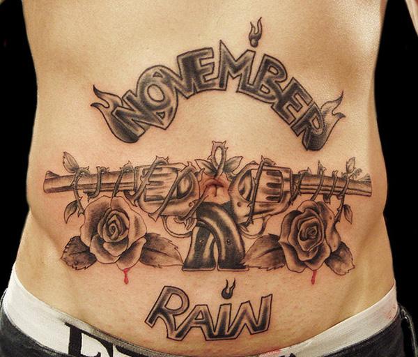 22 gun tattoo 35 Awesome Gun Tattoo Designs