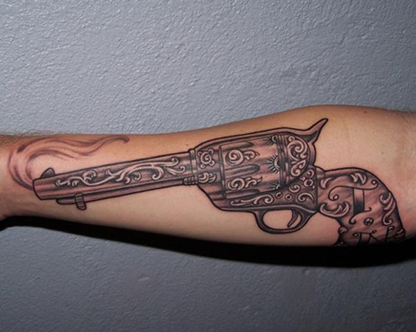 34 gun tattoo 35 Awesome Gun Tattoo Designs
