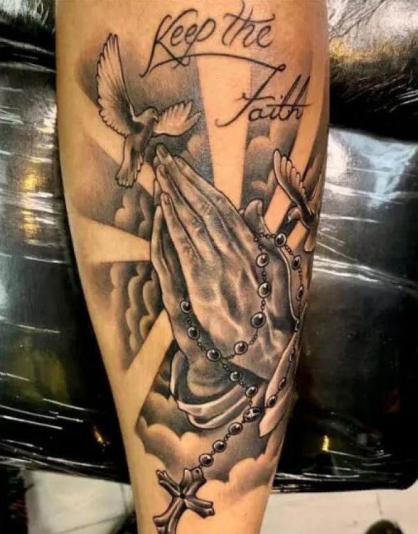 50 Awesome Praying Hands Tattoos