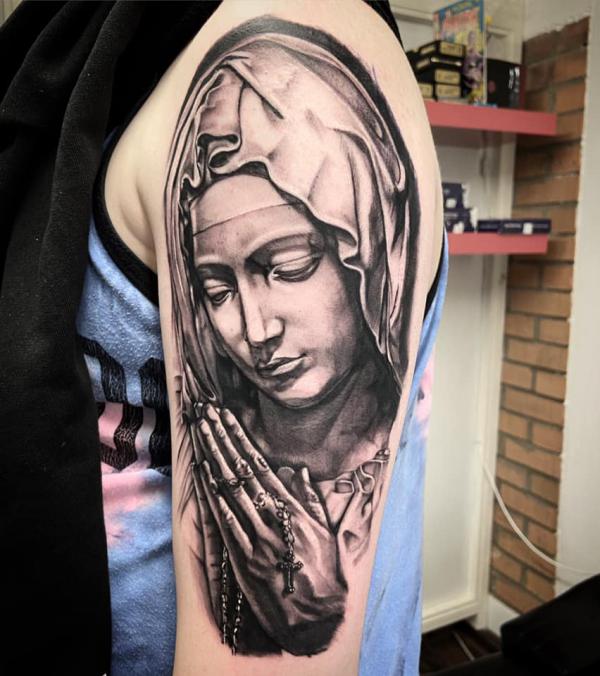 50 Awesome Praying Hands Tattoos