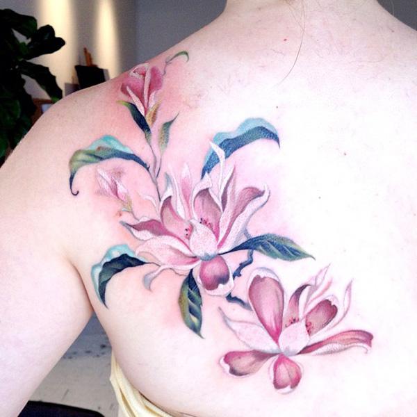 5 Flower on back girly tattoos 50 Examples of Girly Tattoo