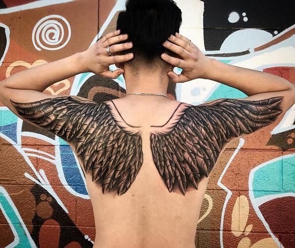 35 Breathtaking Wings Tattoo Designs