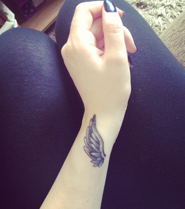 35 Breathtaking Wings Tattoo Designs