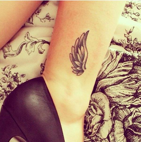 35 Breathtaking Wings Tattoo Designs