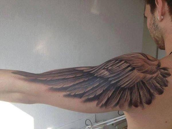 35 Breathtaking Wings Tattoo Designs