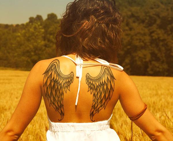 35 Breathtaking Wings Tattoo Designs
