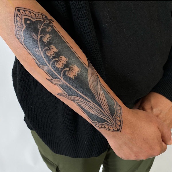 The Enchanting Beauty of Lily of the Valley Tattoos