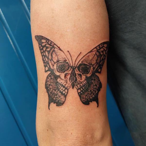 Butterfly Skull Tattoos: A Striking Fusion of Life and Death