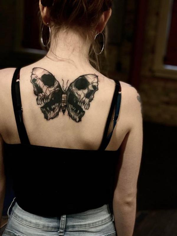 Butterfly Skull Tattoos: A Striking Fusion of Life and Death
