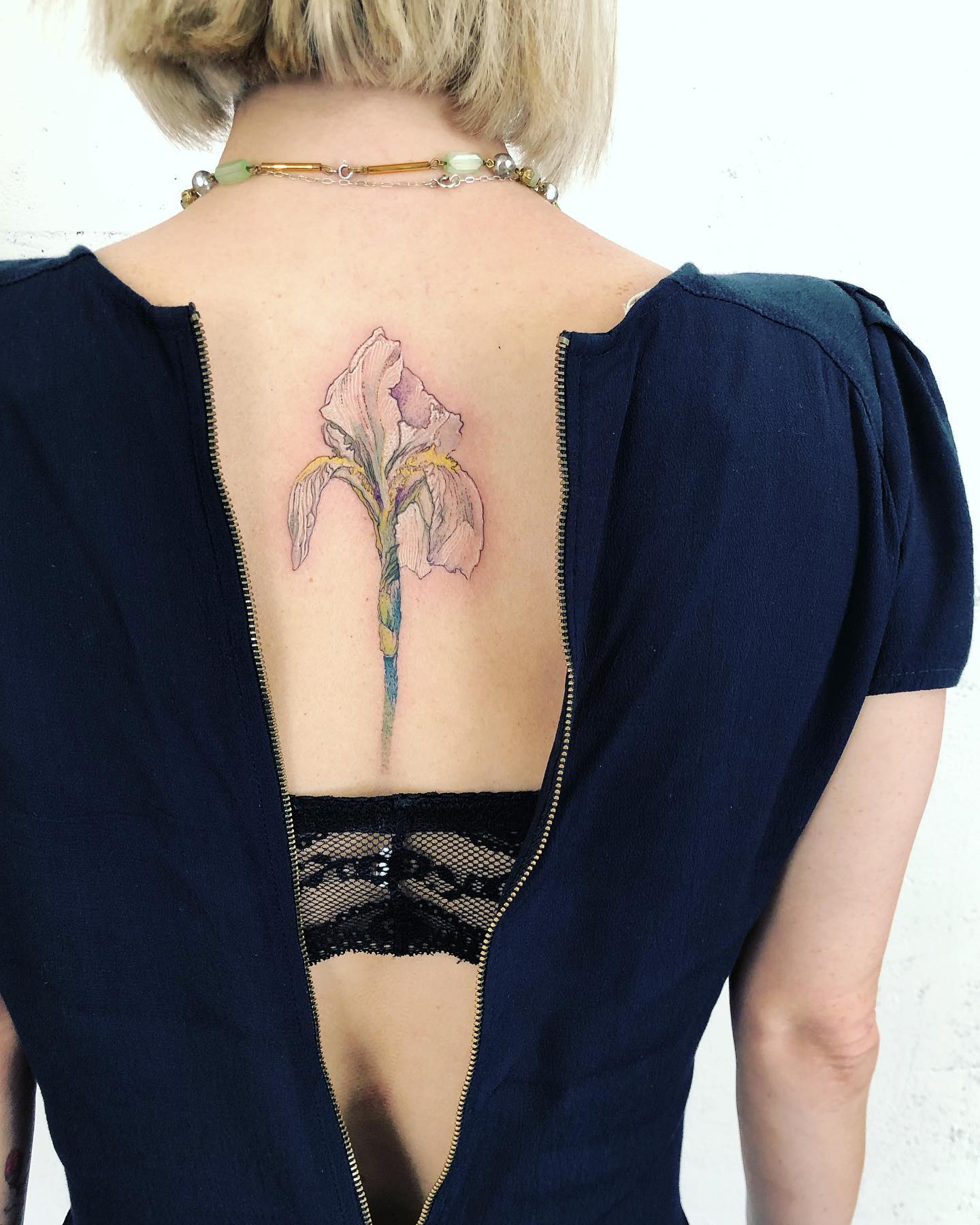 Iris Tattoos: A Blooming Expression of Artistic Beauty