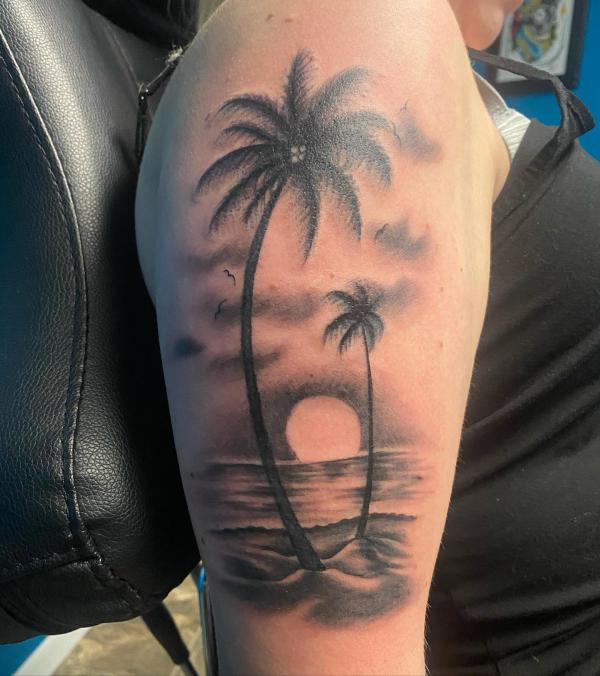 Palm Tree Tattoos: Symbolism and Style of a Tropical Icon