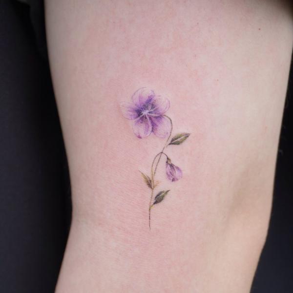 Violet Flower Tattoos: Embodying Beauty, Symbolism, and Enchantment
