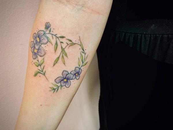 Violet Flower Tattoos: Embodying Beauty, Symbolism, and Enchantment