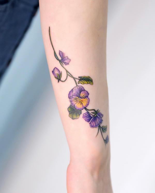 Violet Flower Tattoos: Embodying Beauty, Symbolism, and Enchantment