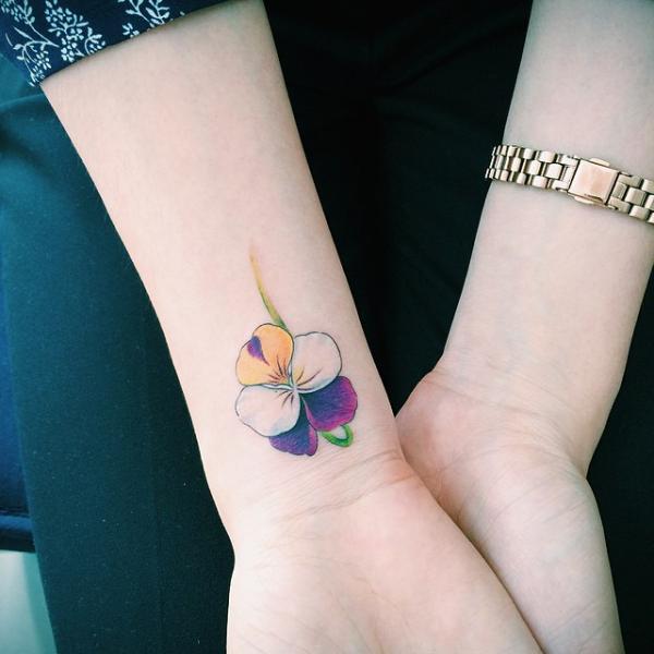 Orchid Tattoos: Symbolism, Styles and Design Ideas