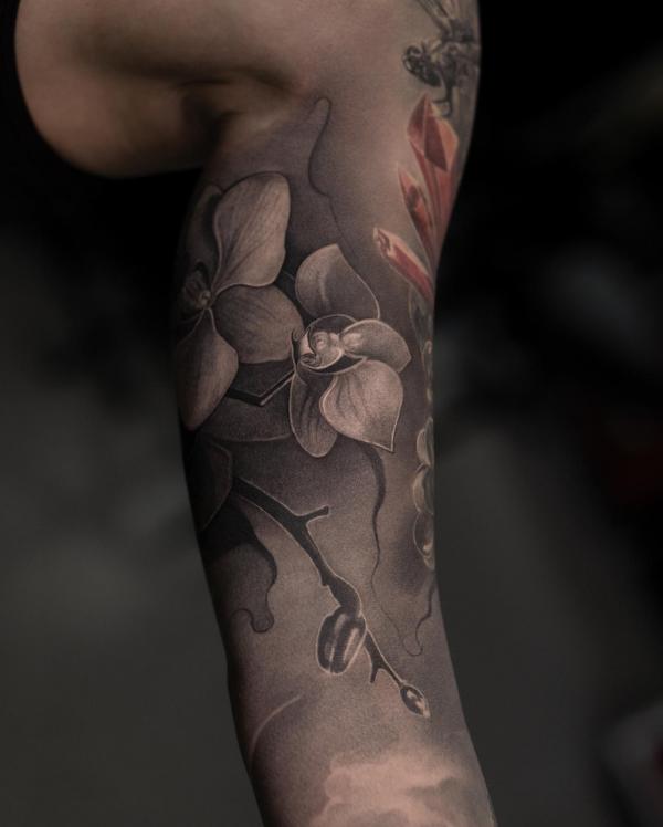 Orchid Tattoos: Symbolism, Styles and Design Ideas