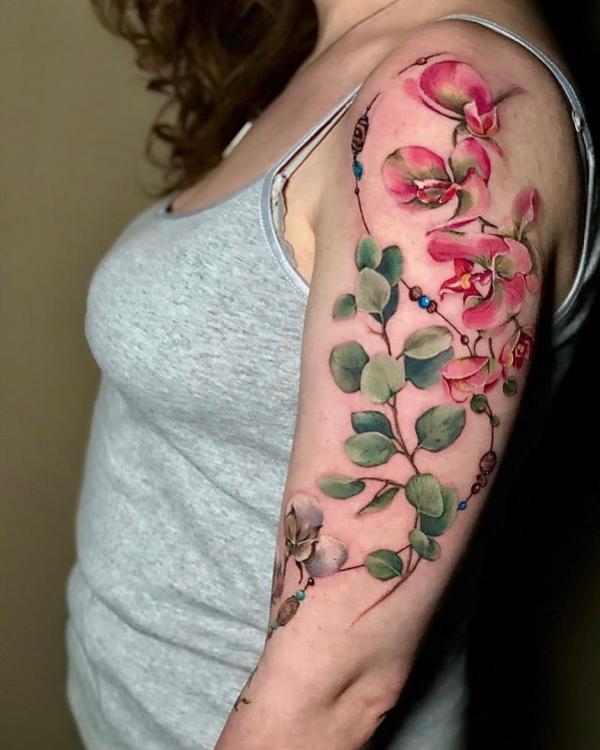 Orchid Tattoos: Symbolism, Styles and Design Ideas