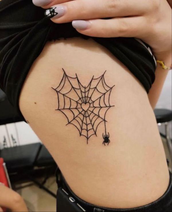 Spider Web Tattoos: Unraveling the Intricate Symbolism