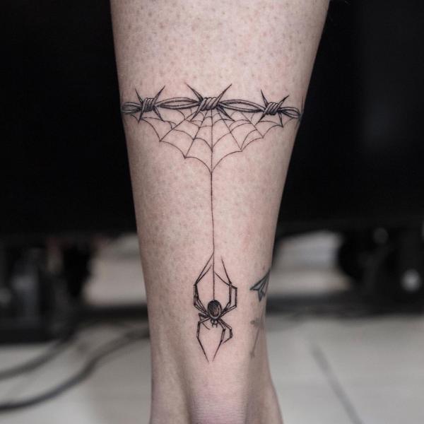 Spider Web Tattoos: Unraveling the Intricate Symbolism