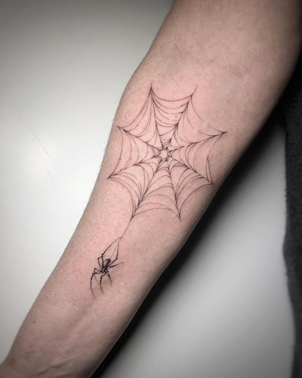 Spider Web Tattoos: Unraveling the Intricate Symbolism