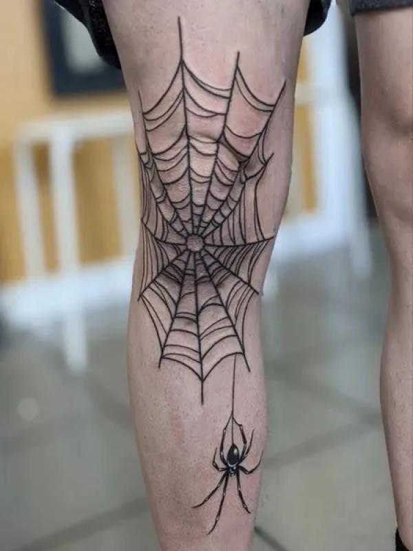 Spider Web Tattoos: Unraveling the Intricate Symbolism