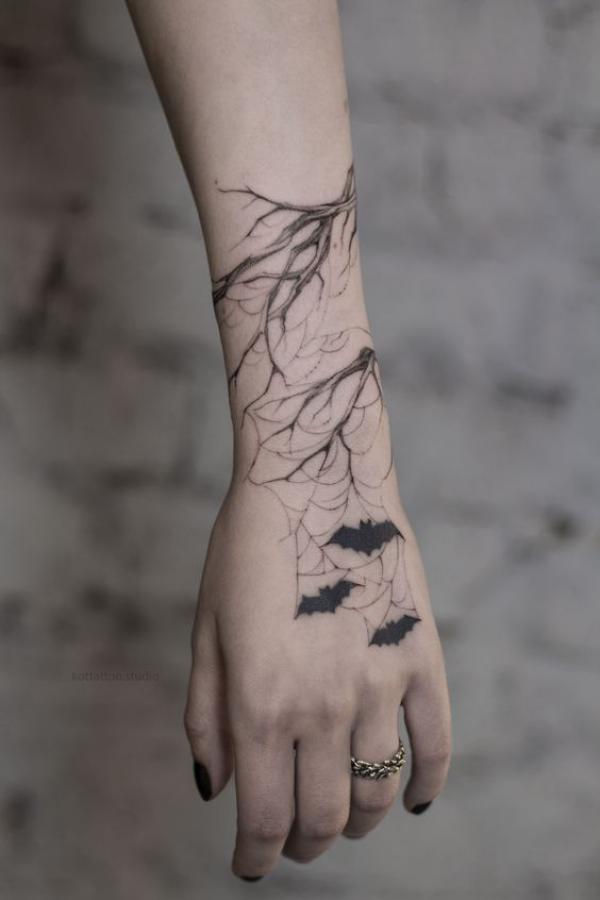 Spider Web Tattoos: Unraveling the Intricate Symbolism