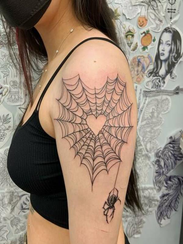 Spider Web Tattoos: Unraveling the Intricate Symbolism