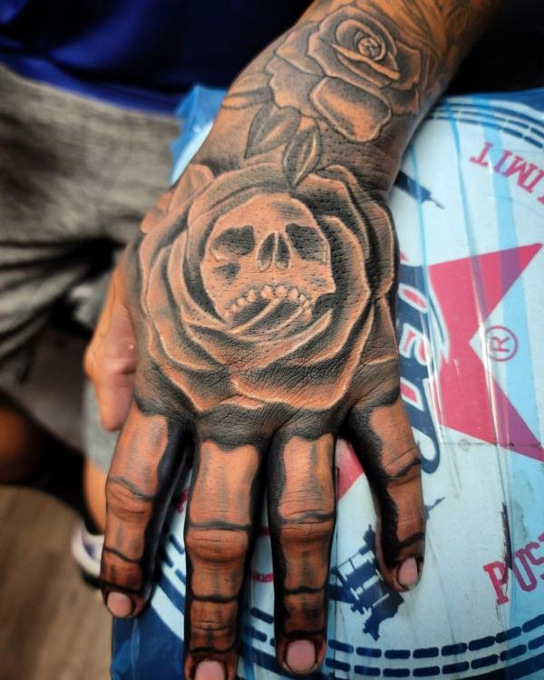 The Art of Ink: The Rose Skeleton Hand Tattoo