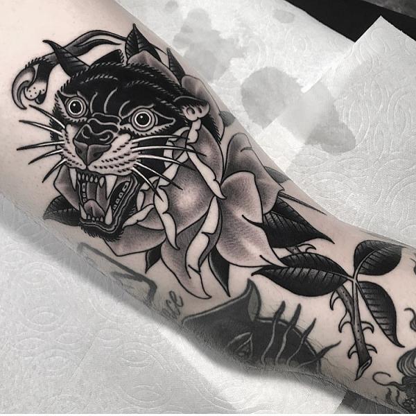 Traditional Rose Tattoos: A Timeless Symbol Inked in Skin