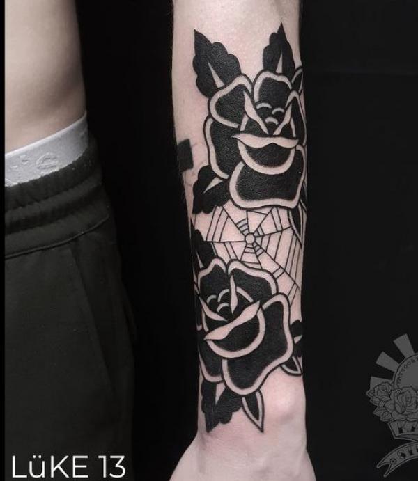 Traditional Rose Tattoos: A Timeless Symbol Inked in Skin