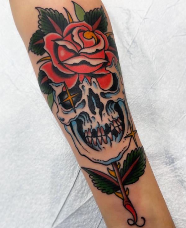 Traditional Rose Tattoos: A Timeless Symbol Inked in Skin