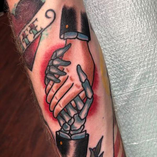 60 Skeleton Hand Tattoo Ideas with Meaning