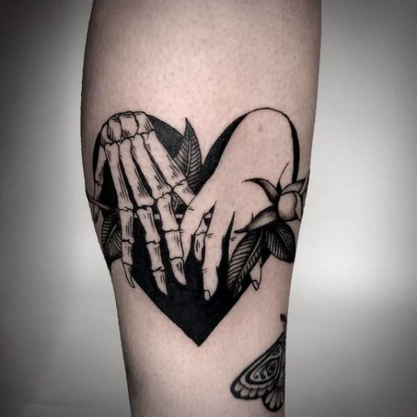 60 Skeleton Hand Tattoo Ideas with Meaning