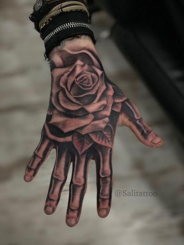 60 Skeleton Hand Tattoo Ideas with Meaning
