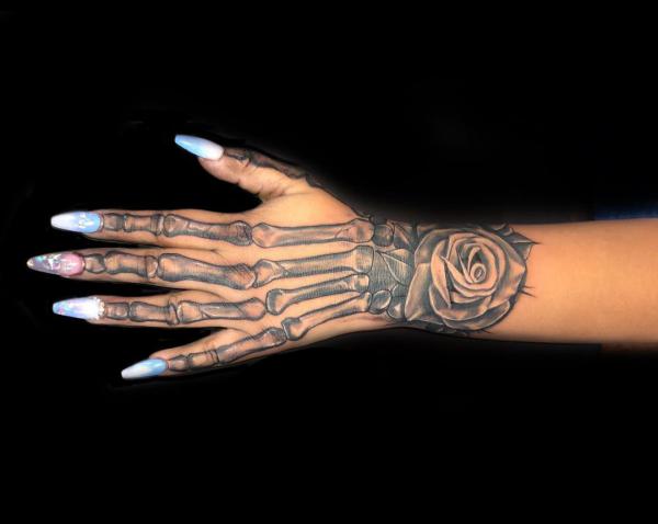 60 Skeleton Hand Tattoo Ideas with Meaning