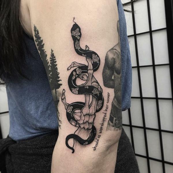 60 Skeleton Hand Tattoo Ideas with Meaning