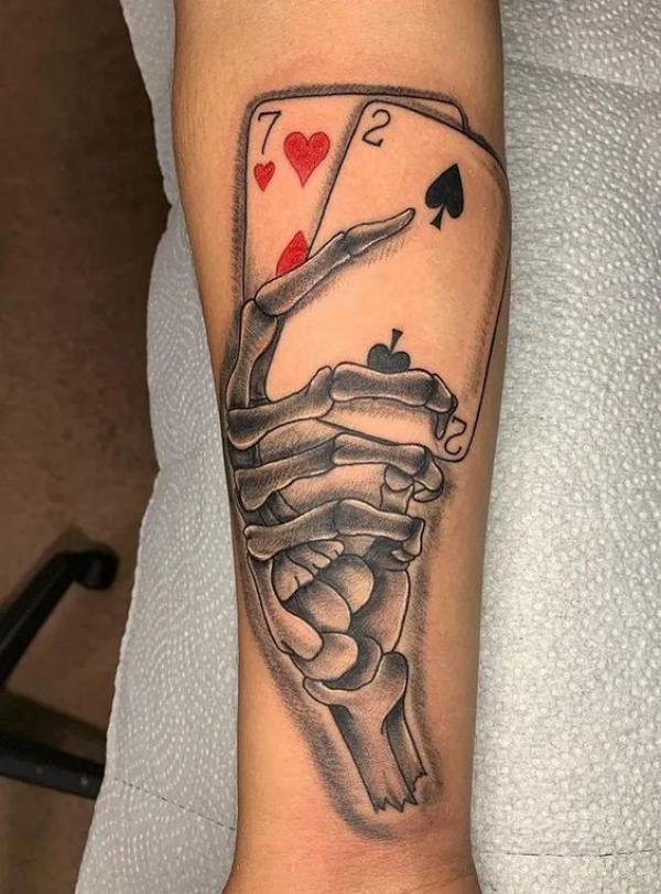 60 Skeleton Hand Tattoo Ideas with Meaning