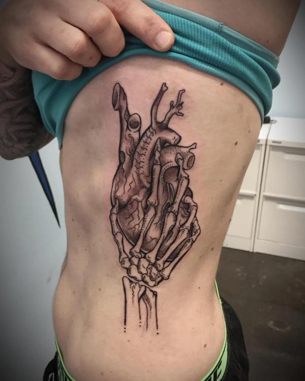 60 Skeleton Hand Tattoo Ideas with Meaning