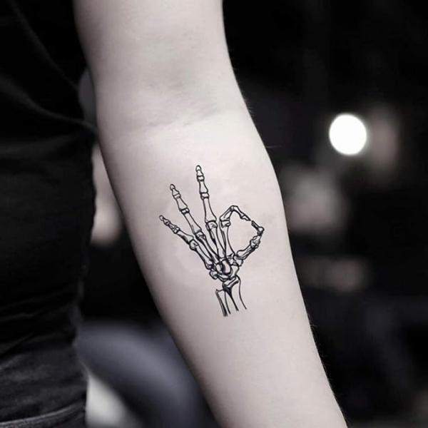 60 Skeleton Hand Tattoo Ideas with Meaning