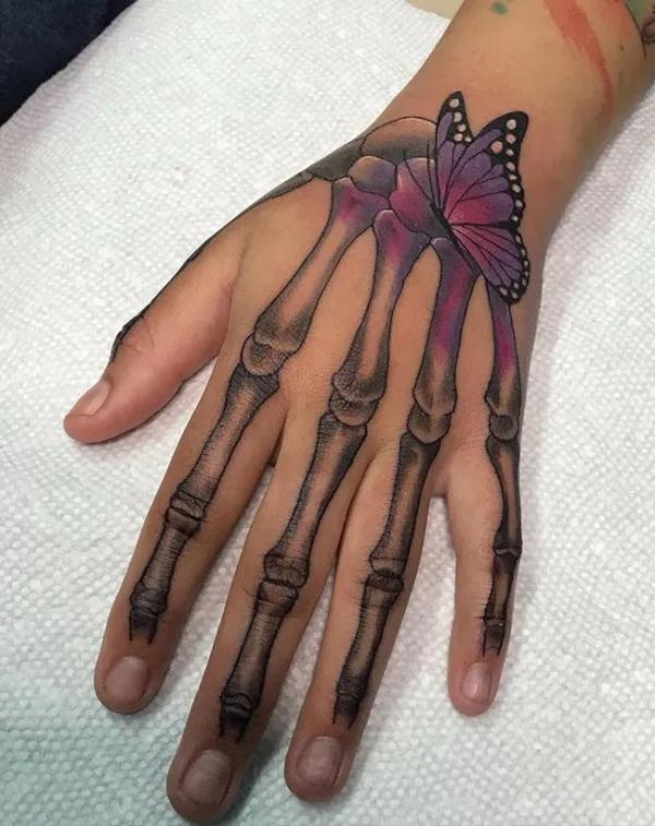 60 Skeleton Hand Tattoo Ideas with Meaning